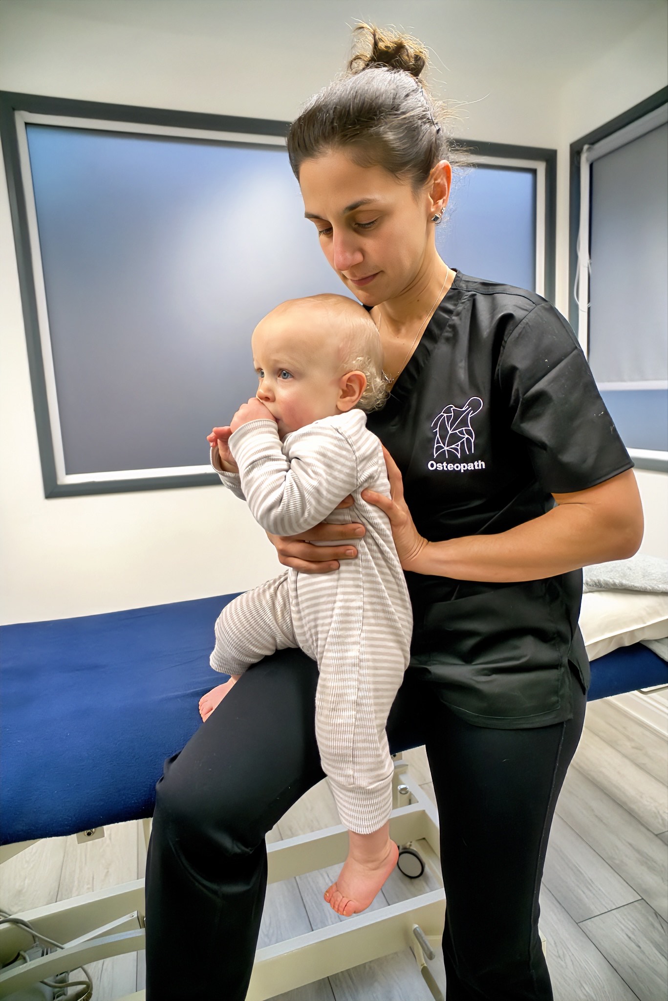 Rianne providing paediatric osteopathic care for a baby